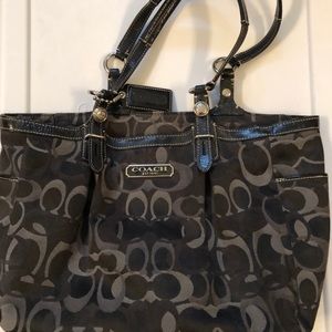 Medium sized, black signature Coach Purse